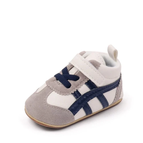 Sportowe sneakersy dla noworodka z miękką podeszwą i zapięciem na rzep, dostępne w kolorze żółtym, bordowym, czarnym i białym.