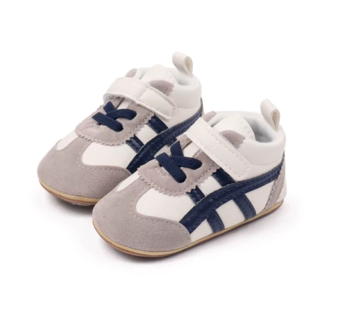 Sportowe sneakersy dla noworodka z miękką podeszwą i zapięciem na rzep, dostępne w kolorze żółtym, bordowym, czarnym i białym.