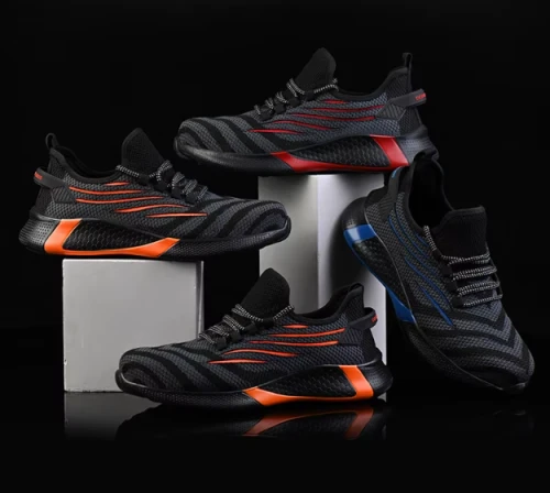 Męskie buty robocze o fasonie sneakersów z podnoskiem ochronnym i antypoślizgową podeszwą, dostępne w kolorze czarnym z kolorowymi akcentami.