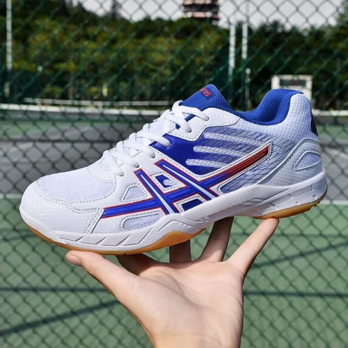 Sportowe buty halowe typu unisex z niebrudzącą gumową podeszwą, idealne do treningów na hali oraz codziennych aktywności sportowych dla kobiet i mężczyzn.