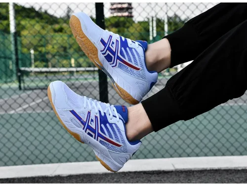 Sportowe buty halowe typu unisex z niebrudzącą gumową podeszwą, idealne do treningów na hali oraz codziennych aktywności sportowych dla kobiet i mężczyzn.